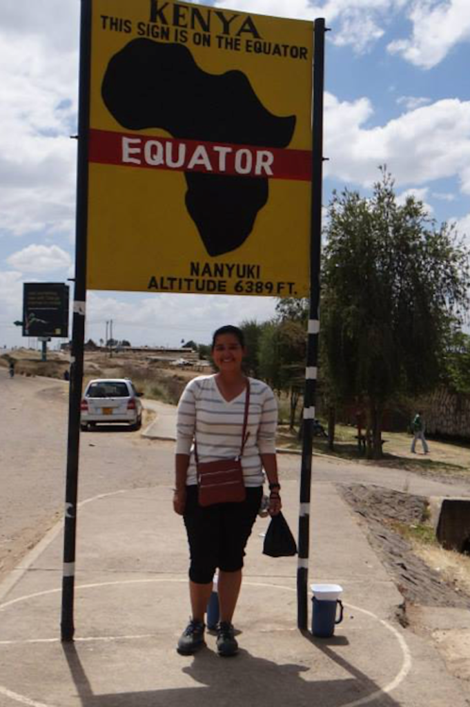 Sofany at the equator in Kenya for a tropical field biology class.